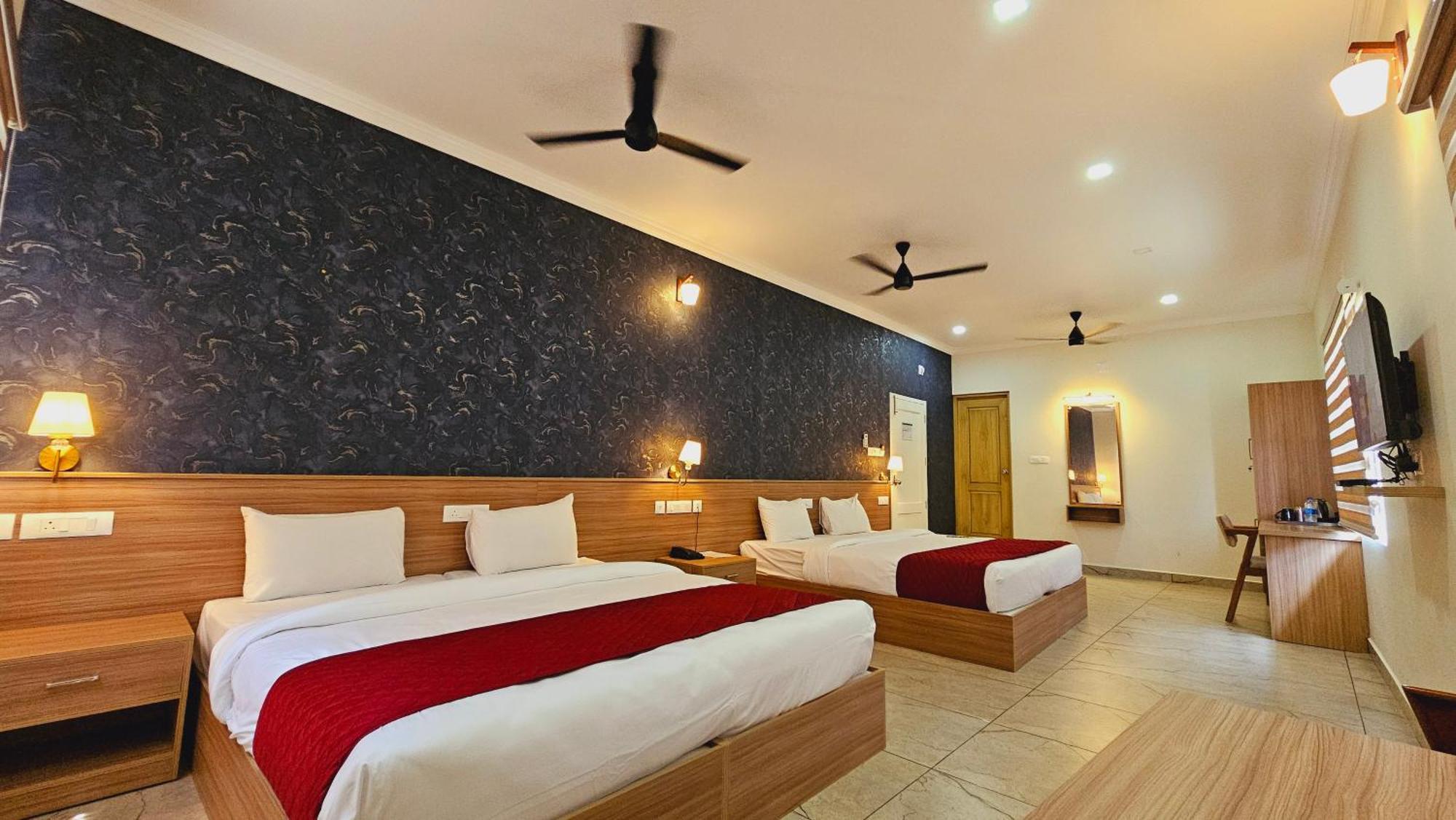 Esaa Airport Hotel Kochi Exteriör bild