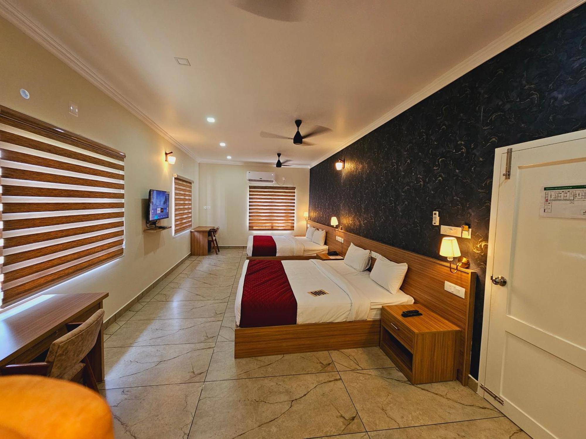 Esaa Airport Hotel Kochi Exteriör bild